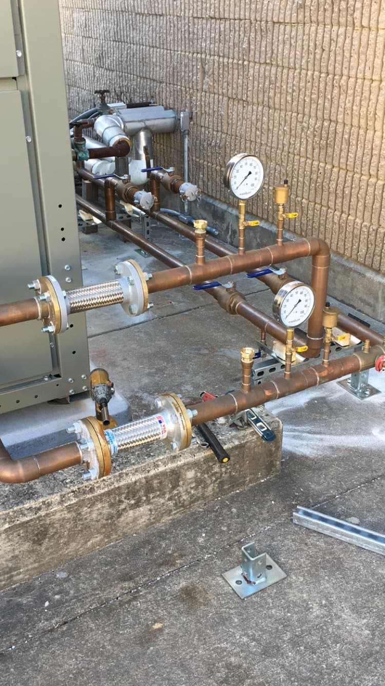 Copper pipe mechanical system installation with pressure gauges by Milloway Pipeworks